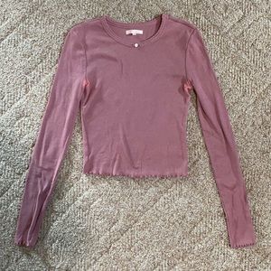 A size small long sleeve and a little cropped Maroon/ pink top from Lottie Moss.